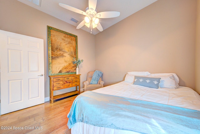 bedroom featuring ceiling fan and wood-type flooring