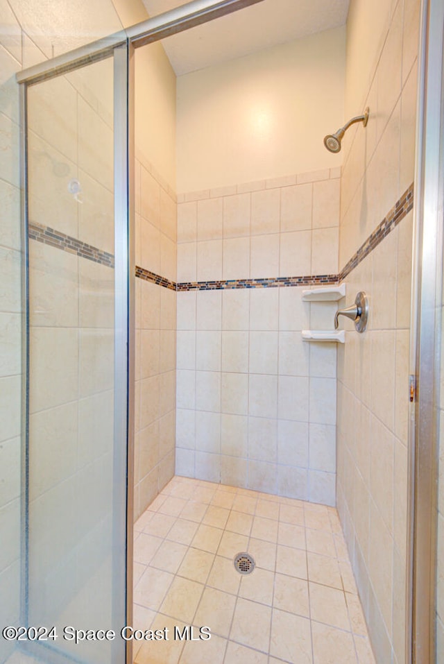 bathroom featuring an enclosed shower