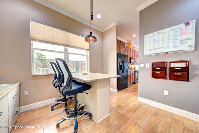 office area with crown molding and light wood-type flooring