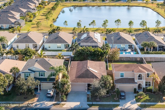 drone / aerial view with a water view