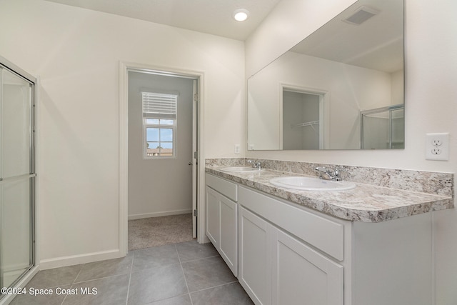 bathroom featuring vanity and tile patterned floors