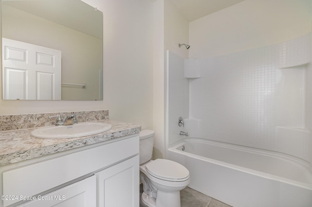 full bathroom with bathtub / shower combination, vanity, tile patterned flooring, and toilet