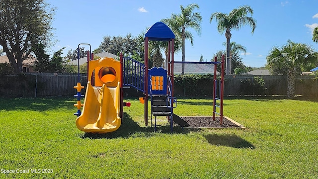 view of jungle gym with a yard