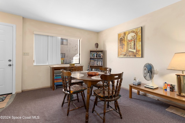 dining area featuring carpet flooring