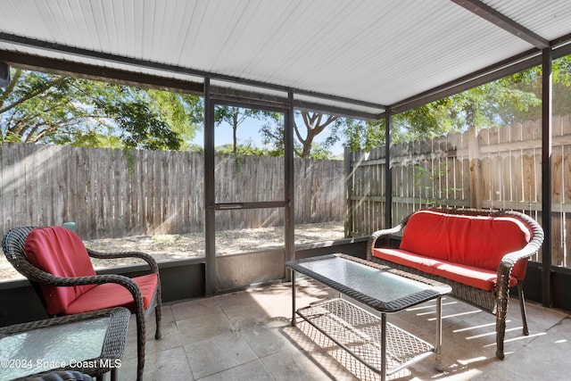 sunroom / solarium featuring a wealth of natural light