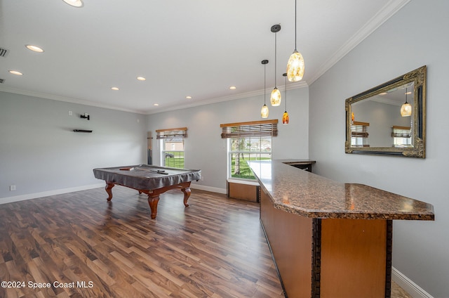 playroom featuring dark hardwood / wood-style floors, crown molding, and billiards