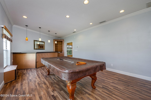 rec room with dark hardwood / wood-style flooring, pool table, and ornamental molding