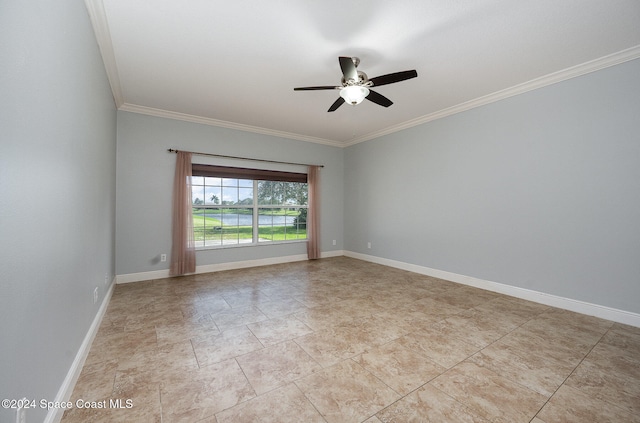 empty room with ceiling fan and crown molding