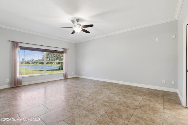 empty room featuring ceiling fan and ornamental molding