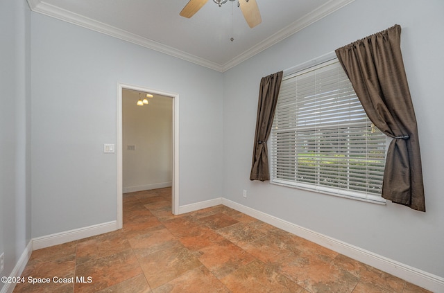 spare room with ceiling fan and ornamental molding