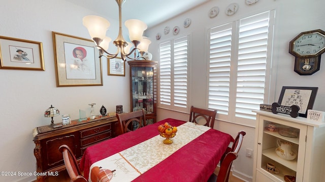 dining area with a chandelier