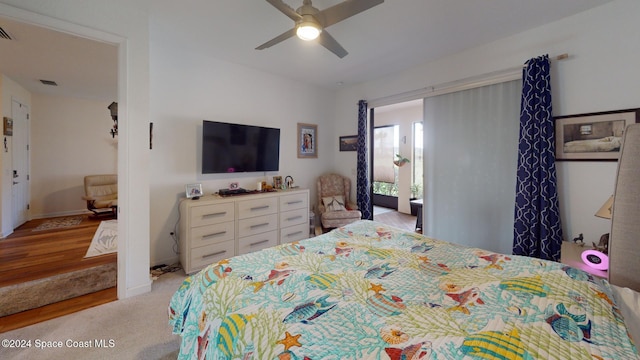 bedroom featuring ceiling fan and light hardwood / wood-style floors