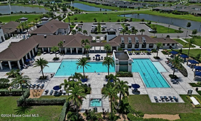 bird's eye view with a water view