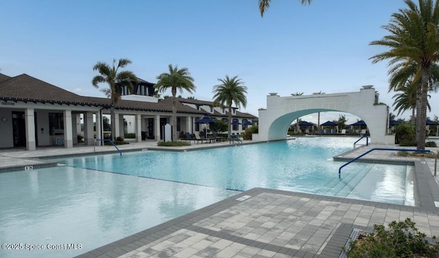 pool with a patio area