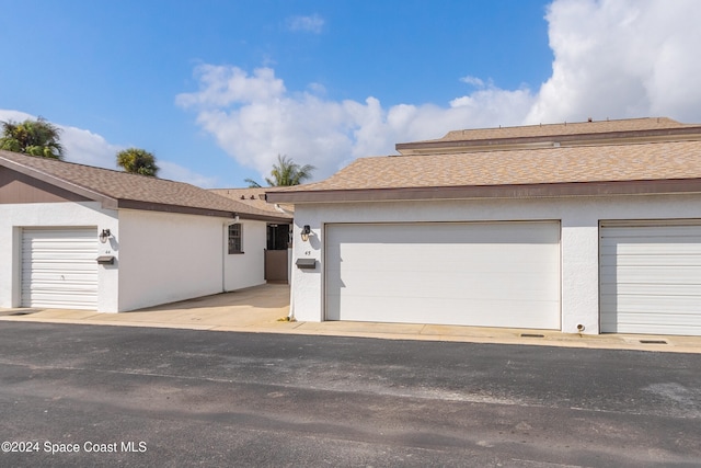 ranch-style home with a garage