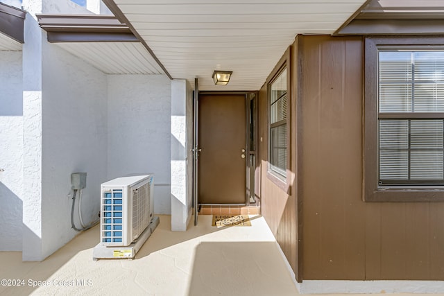 entrance to property featuring ac unit