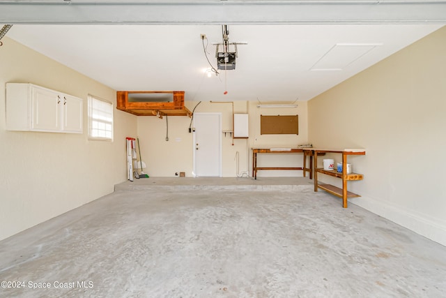 garage featuring a garage door opener