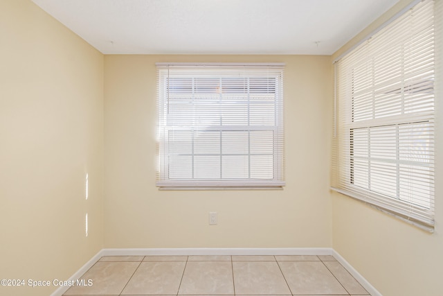 view of tiled spare room