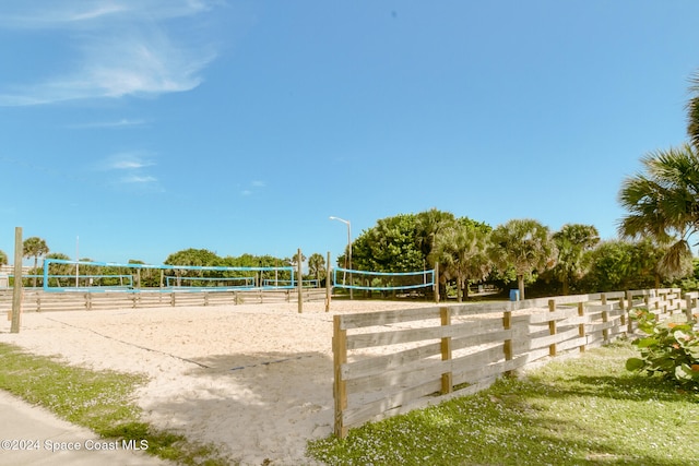 view of home's community featuring volleyball court