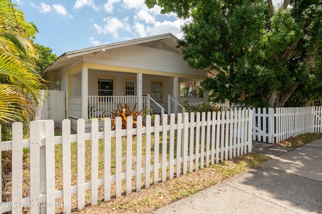 view of front of home featuring covered porch