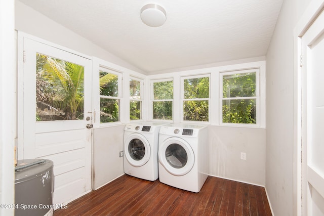 laundry room featuring independent washer and dryer and dark hardwood / wood-style floors