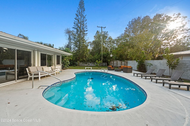 view of pool featuring an outdoor hangout area and a patio area