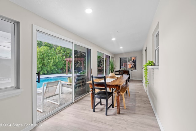 dining room with light hardwood / wood-style flooring