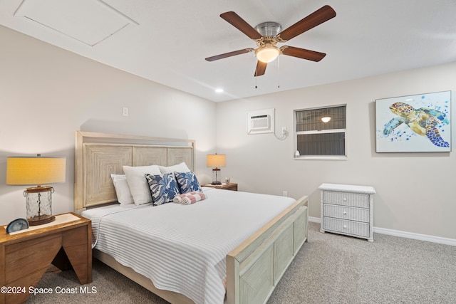 bedroom featuring a wall unit AC, ceiling fan, and light carpet