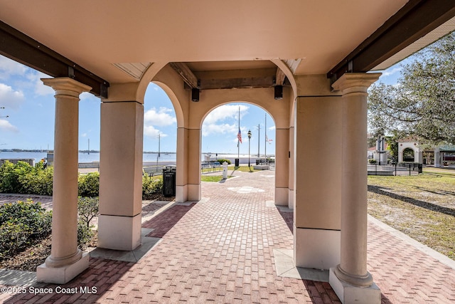 view of patio featuring a water view