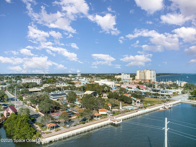 aerial view with a water view and a city view