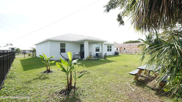 view of yard featuring central AC