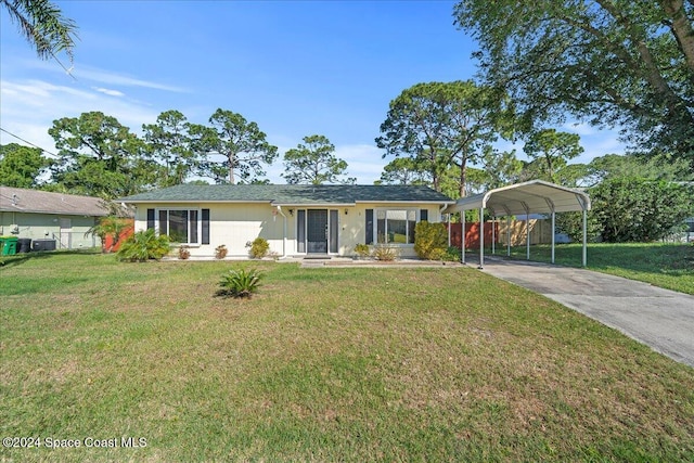 single story home featuring a front lawn and a carport