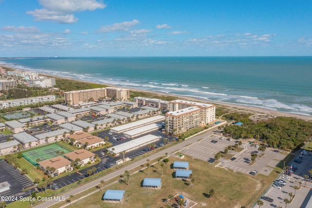 aerial view with a view of the beach and a water view