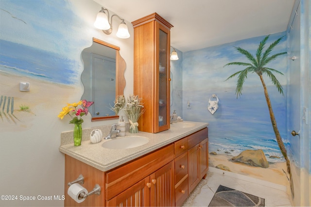 full bathroom with tile patterned floors, a sink, and double vanity