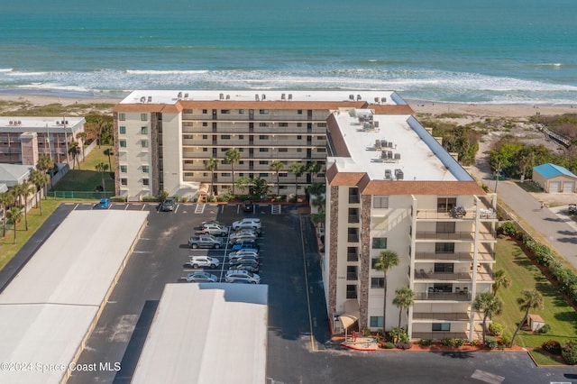 aerial view with a view of the beach and a water view