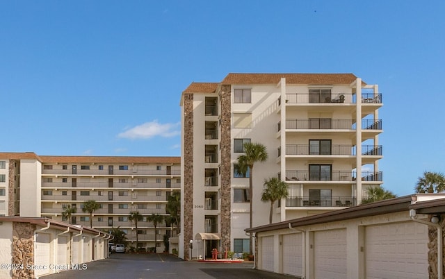 view of property with community garages