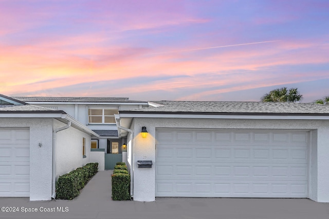 view of front of home featuring a garage