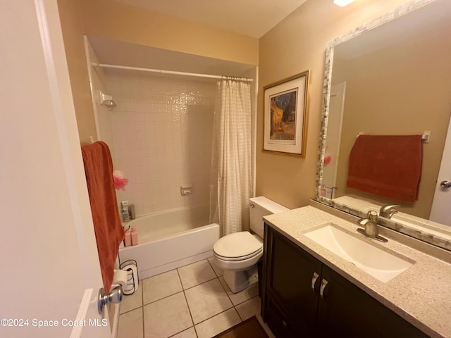 full bathroom with toilet, tile patterned flooring, vanity, and shower / tub combo with curtain