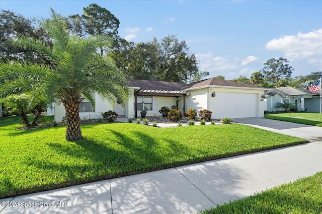 single story home featuring a front yard and a garage