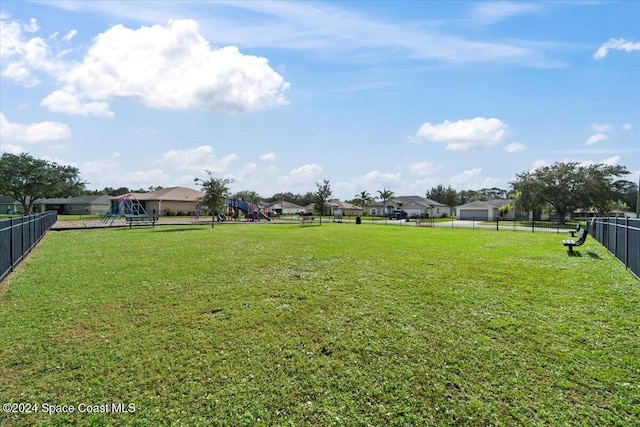 view of yard with a playground