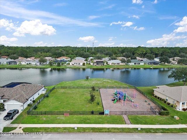 birds eye view of property featuring a water view