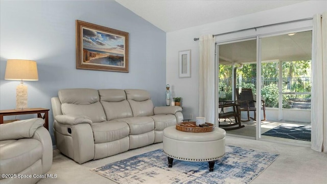 living room with light carpet and lofted ceiling