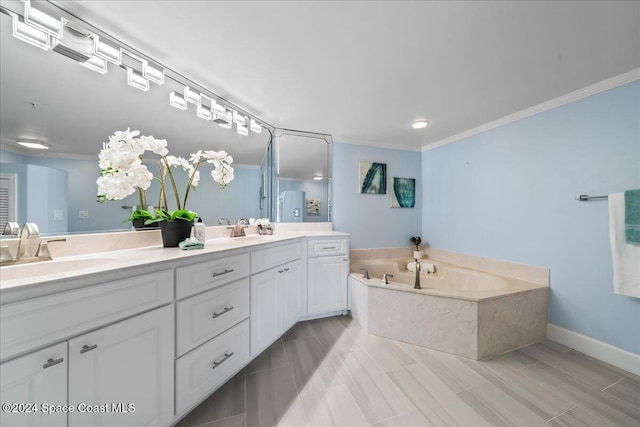 bathroom with tiled tub, vanity, and ornamental molding