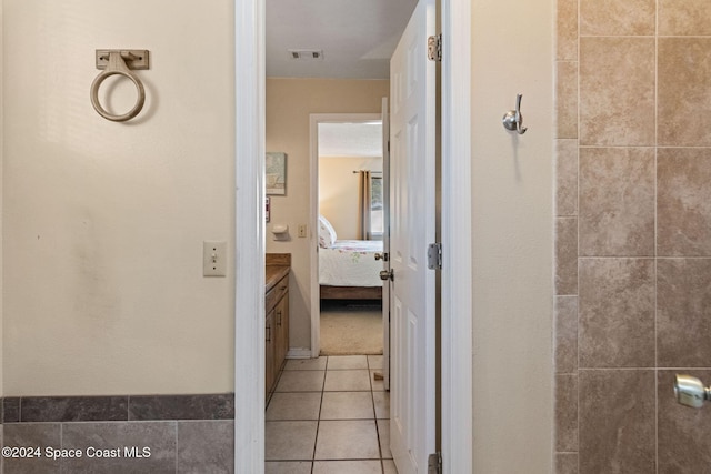 bathroom featuring tile patterned flooring