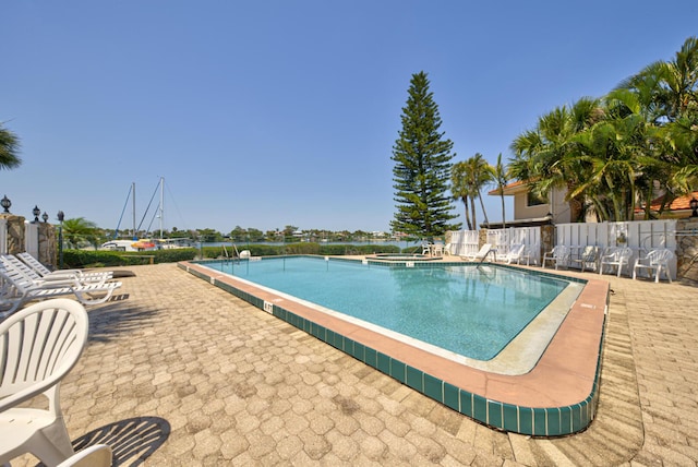 community pool featuring a patio