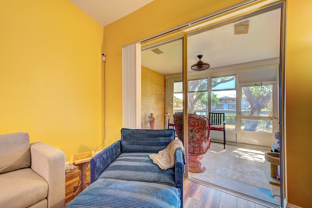 sitting room featuring hardwood / wood-style floors