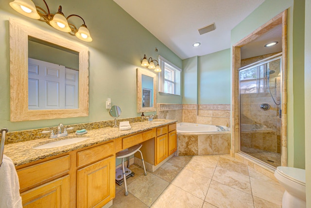 full bathroom with separate shower and tub, tile patterned floors, vanity, and toilet