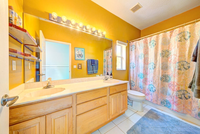 bathroom featuring walk in shower, tile patterned floors, a textured ceiling, toilet, and vanity