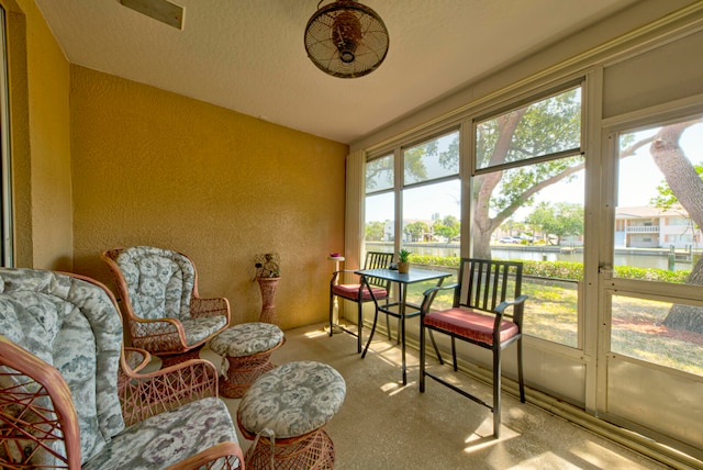 sunroom with a water view