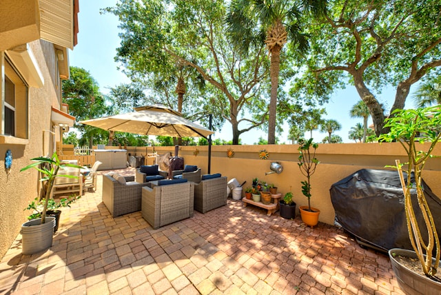 view of patio featuring a grill and an outdoor living space